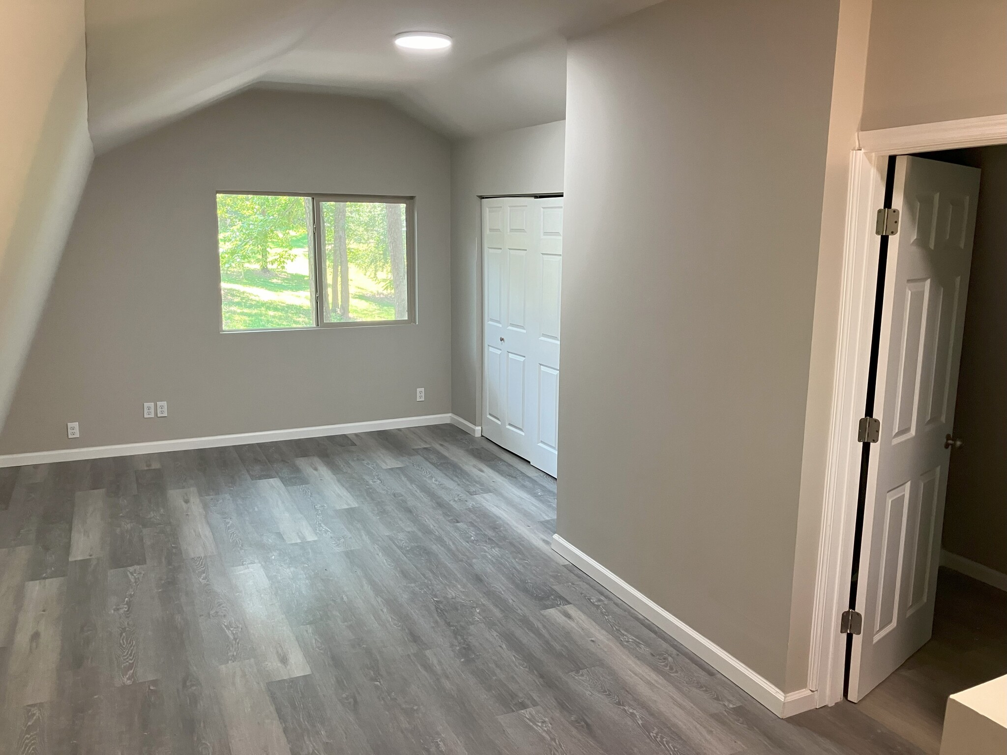 Second floor bedroom loft with door to bathroom - 497 Annie Lee Rd