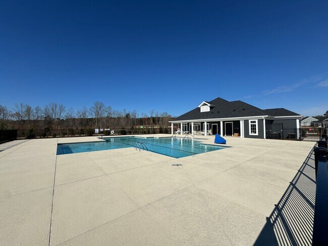 Building Photo - Spacious 1.5-Story 4BR Home with Bonus Room in Active 55+ Community