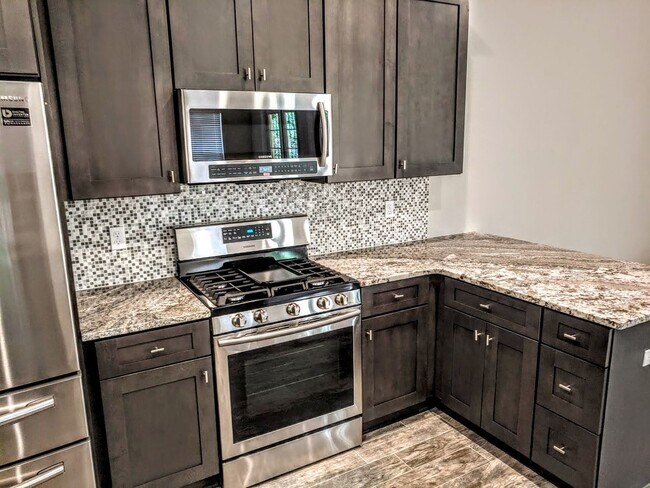 Building Photo - An amazing Townhouse for people who like big open space down Bedroom 4 Bathroom 3.5