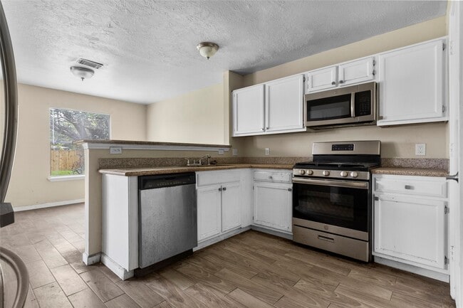 Building Photo - 6703 Ashland Forest Dr