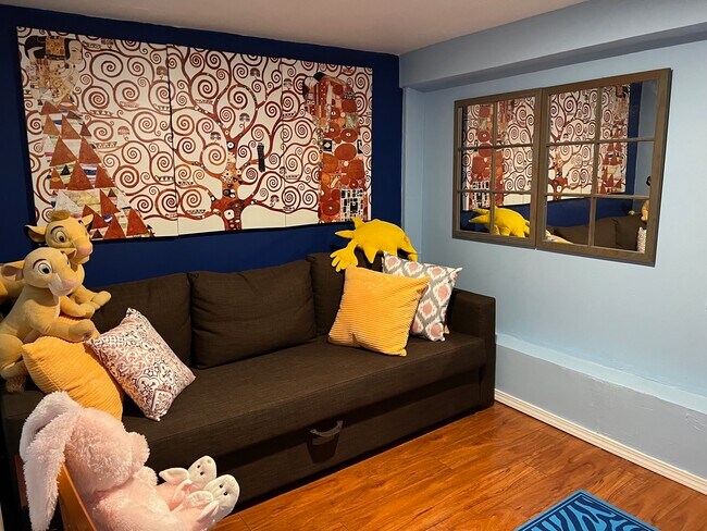 The study with desk, chair and quean size sofa bed - 1627 15th Ave