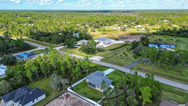 Building Photo - 6227 Tropicaire Blvd