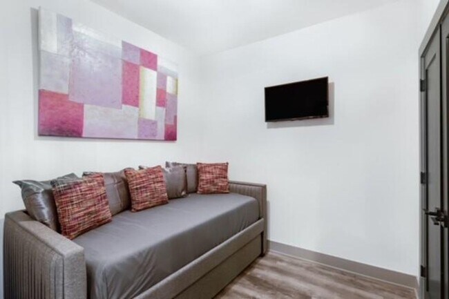 Building Photo - Modern Living Meets Walkable City Charm in...