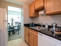Building Photo - "Chic Urban Living: Cozy 1-Bedroom Condo w...