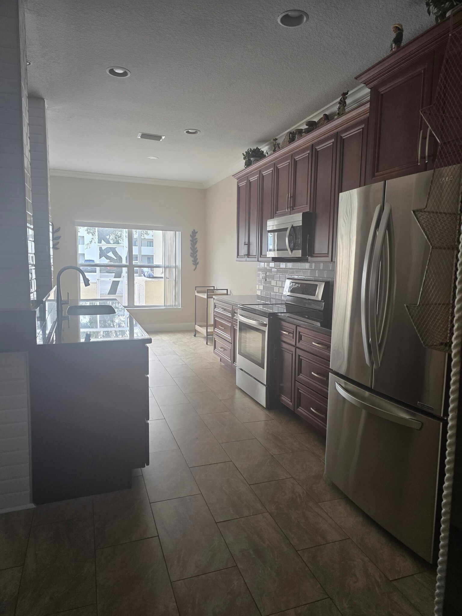 Kitchen facing back of property - 802 King Neptune Ln
