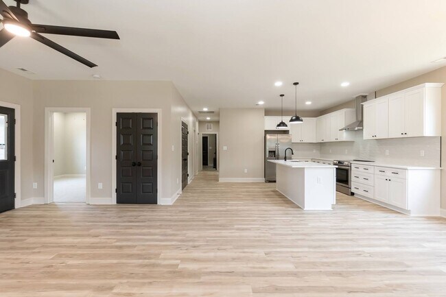 Building Photo - Comfort and Space with Easy Access to the ...