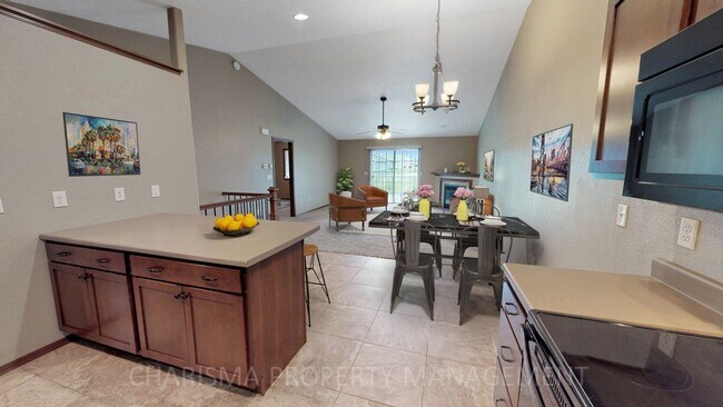 Building Photo - SPACIOUS AND AMENITY FILLED 3 BD, 2.5 BA T...