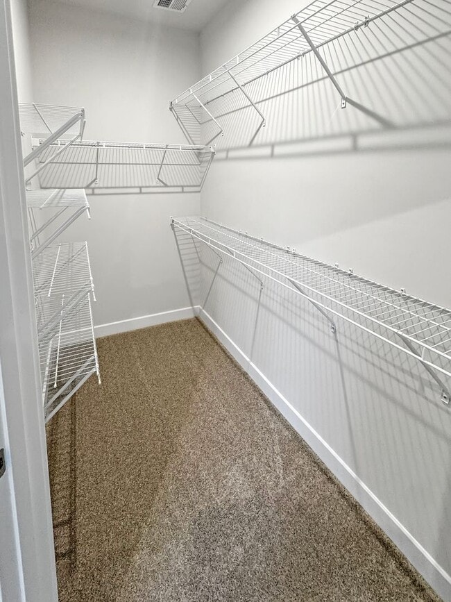 Building Photo - Spacious 3-Bedroom Townhome with Finished ...