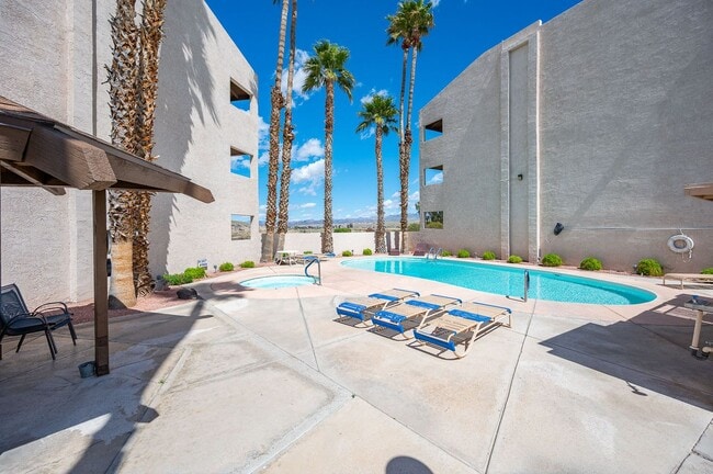 Building Photo - Waterfront 2BR 2B Condo Lower Level, gated with tennis,pool,spa,PRIVATE BEACH/DOCK