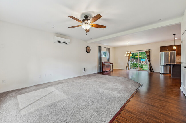 Livingroom flowing into dining area - 9306 208th Ave E