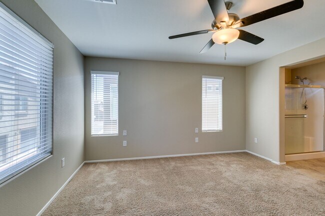 Building Photo - Spacious Townhouse with Loft & Rare 3-Car Garage!