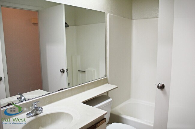 Building Photo - $2,895 - Upstairs 2 Bedroom/1 Bath Condo
