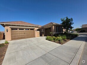 Building Photo - Gorgeous 4 Bedroom 3 Bath Home with a Pool...
