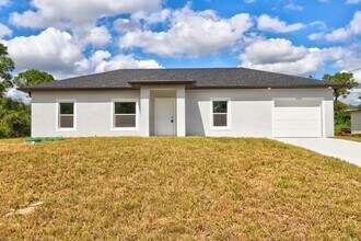 Building Photo - BRAND NEW 3B/2B/1 CAR GARGE-  SW LEHIGH ACRES