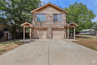 Building Photo - Darling Duplex Coming in April!