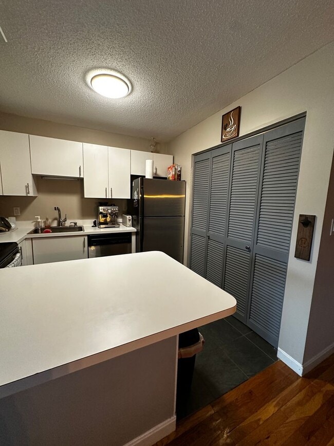 Building Photo - No Brokers Fee!! Spacious 2-Bed, 2-Bath Condo with 2 Parking Spots in Medford