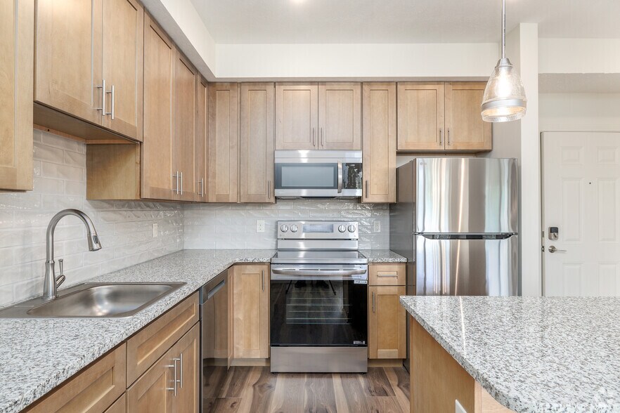 2BR, 2BA - 1,267SF - Kitchen - Treeline Apartments