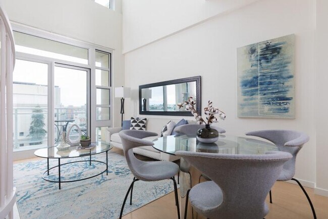 Building Photo - Penthouse loft with a private rooftop patio