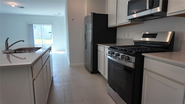 Building Photo - 10722 NW Moon Rise Ln