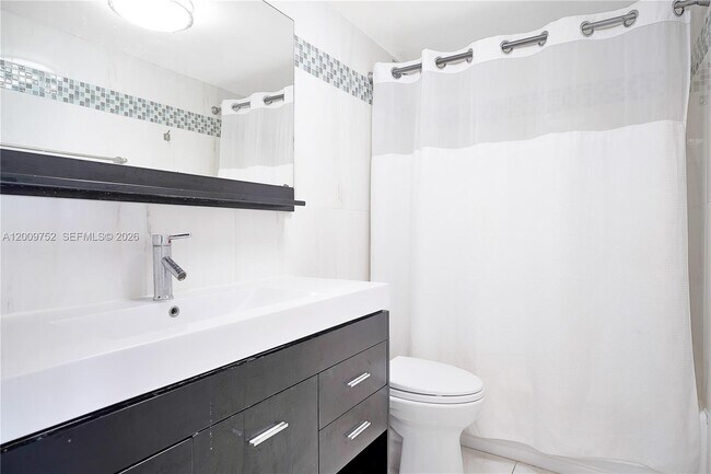 Building Photo - 4747 Collins Ave