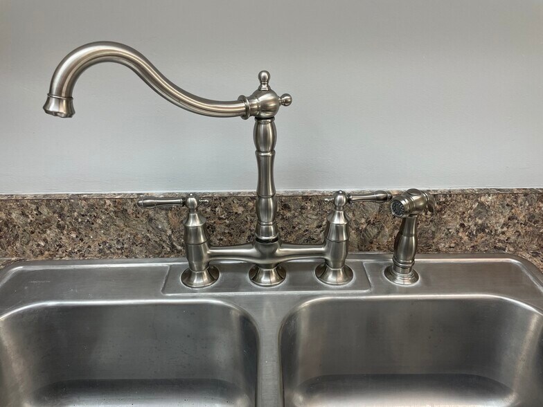 Bridge faucet in kitchen - 1804 Colonial Village Way