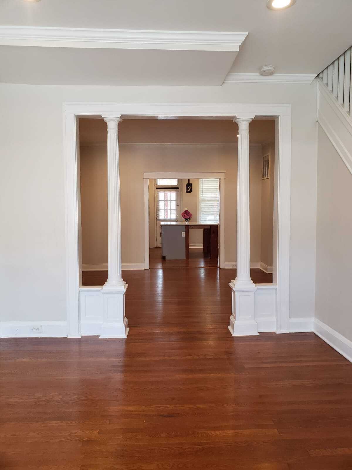 Front living room looking through dining room into kitchen and rear of first floor - 410 Cornwall St