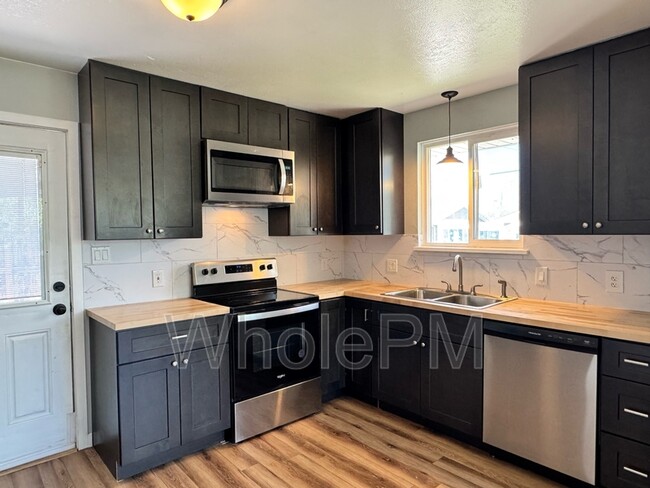 Building Photo - 220 W Layton Ave