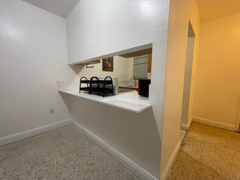 Kitchen view from living room 2 - 665 NE 83rd Ter