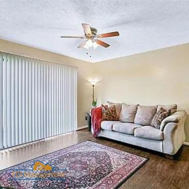 Building Photo - Modern First-Floor with Private Patio in Hampton Club