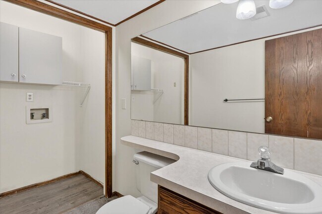 Building Photo - 4BR/4BA Updated Home with Finished Basement Suite & Landscaped Yard