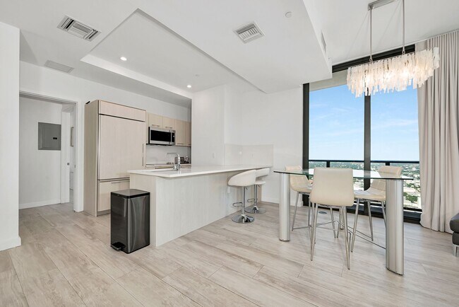 Building Photo - Remarks:	Enjoy stunning Skyline and Bay views from the wraparound balcony of this furnished 2-bed...