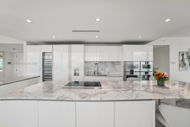 Building Photo - 10203 Collins Ave