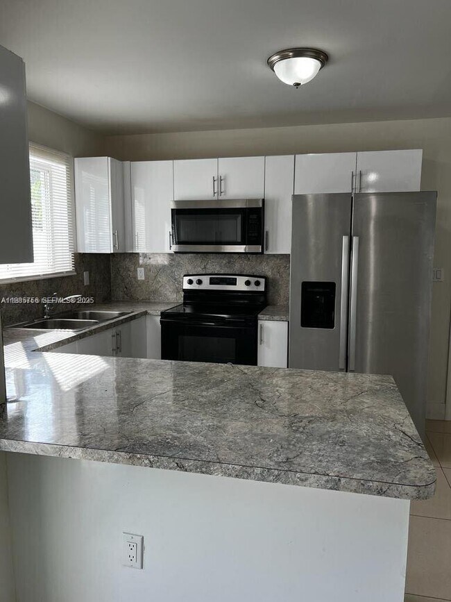 Building Photo - 1740 NW 64th St