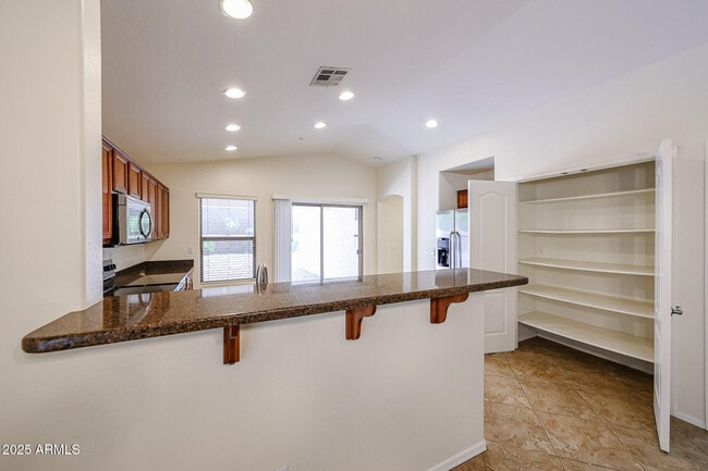 Building Photo - 12848 W Desert Mirage Dr