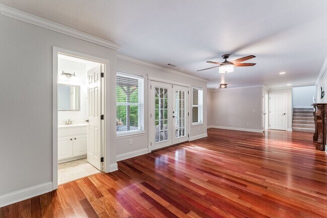 Building Photo - Spacious Bella Vista Retreat with Sunlit Interiors & Outdoor Oasis