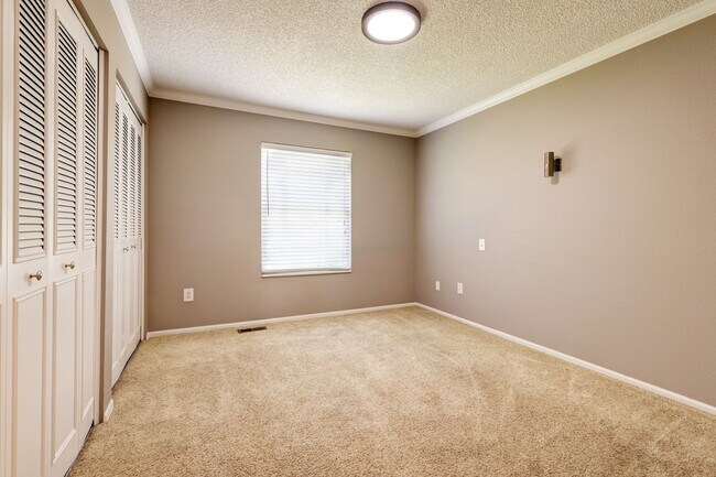 Building Photo - Spacious 4-Bedroom Home with Private Backy...