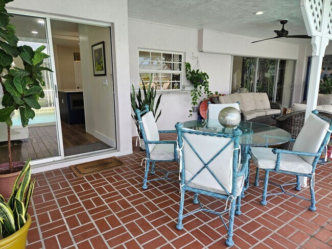 Building Photo - Annual Rental or 6+ month option - FURNISHED HEATED POOL HOME. Gorgeous 3 Bedroom, 3 Bath, 2 Car ...