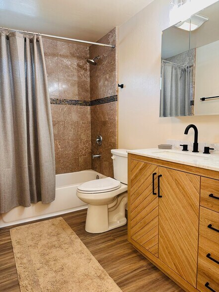 Bathroom 1 with tub and shower. - 358 22nd St