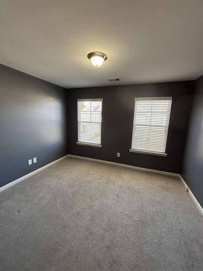 Building Photo - Gated Private Community! Spacious 3 Bedroom and 2.5 Bath End Unit Townhome