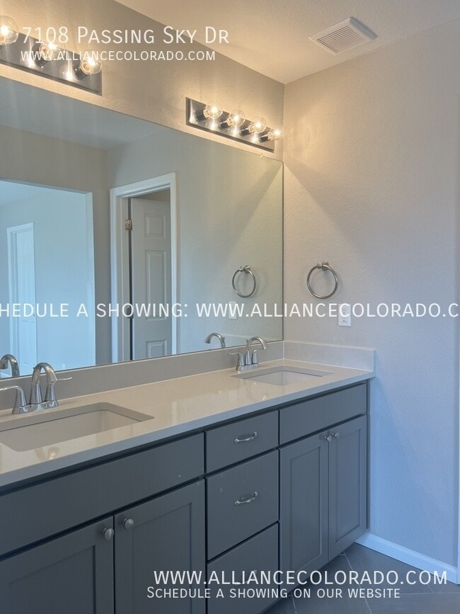 Building Photo - 7108 Passing Sky Dr