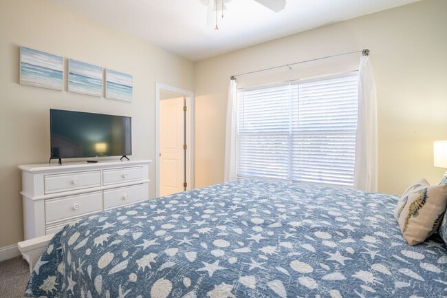 Building Photo - PRICE REDUCTION! LIVE AT THE BEACH FOR THE...