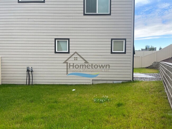 Building Photo - Woodbridge South Home with 4 Bedrooms and 3 Bathrooms in Post Falls build in 2021!