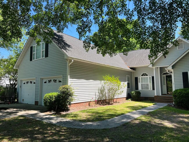 Building Photo - 4 Bed | 3 Bath Home with 1st-Floor Primary...