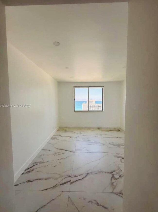 Building Photo - 19370 Collins Ave