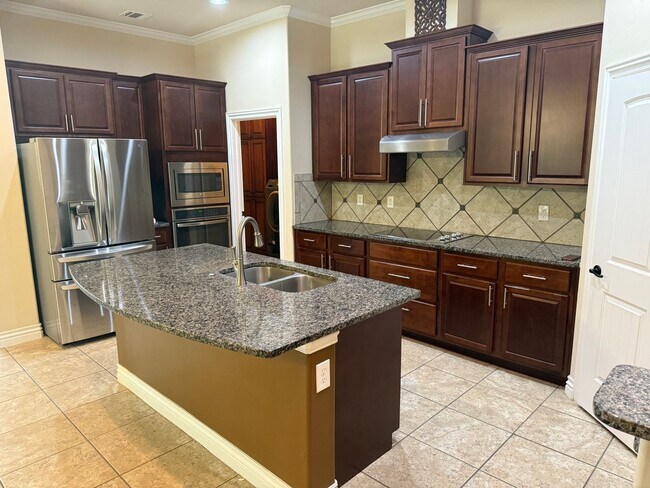 Building Photo - 3 bedroom + office  or 4th bedroom, storm shelter, neighborhood pond and walking track!
