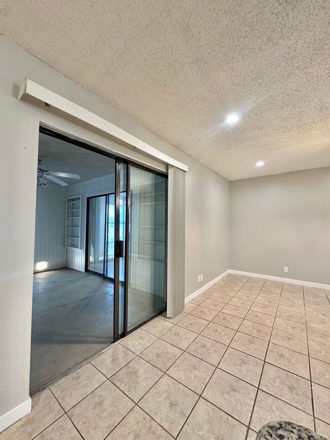 Building Photo - COMING MARCH 2026 - 2-Bedroom 2-Bathroom Condo + Clubhouse/Pool/River Access