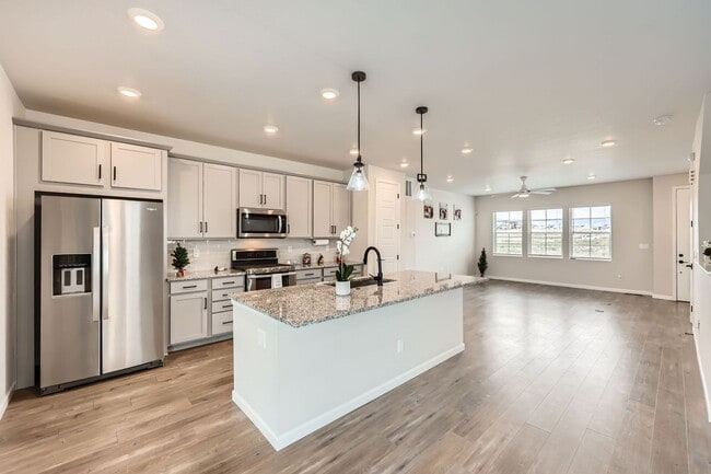 Building Photo - Evolve Real Estate: Available Immediately! Almost NEW Large 3 Bedroom in STERLING RANCH!