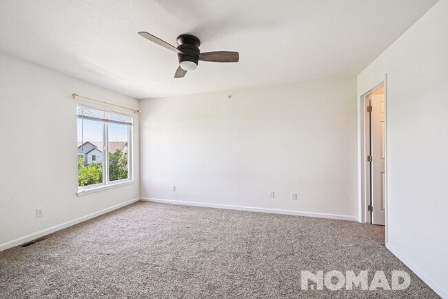 Building Photo - Spacious 3-Bed, 2-Bath Townhome with Garag...