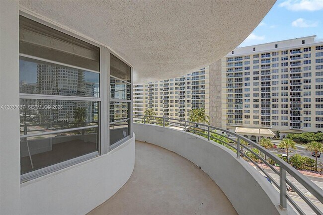 Building Photo - 5555 Collins Ave