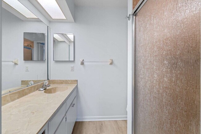 Building Photo - Freshly Updated 2BR Condo with Private Balcony, Community Pool, & In-Unit Laundry